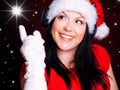 Christmas woman pointing star Royalty Free Stock Photo