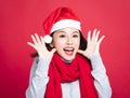 Christmas woman wearing santa hat and surprised Royalty Free Stock Photo