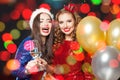 Christmas women on abstract bokeh glitter sparkle party background Royalty Free Stock Photo