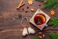 Christmas wooden backdrop with spruce branches and aroma spices and cookies