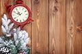 Christmas wooden background with clock, snow fir tree Royalty Free Stock Photo