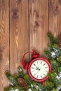Christmas wooden background with clock, snow fir tree Royalty Free Stock Photo