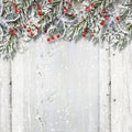 Christmas wooden background with fir branches and holly Royalty Free Stock Photo