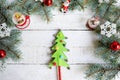 Christmas wooden background with fir tree and decoration, new yaer toys Royalty Free Stock Photo