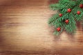 Christmas wooden background with fir tree and decoration stars. Top view with copy space for your text Royalty Free Stock Photo