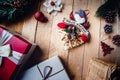 Christmas Navidad wooden background with gift boxes, Christmas balls, branches, tree, and decorations Royalty Free Stock Photo