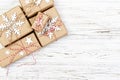 Christmas wooden background with gift boxes and decor. Top view with copy space for your text Royalty Free Stock Photo