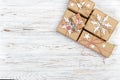 Christmas wooden background with gift boxes and decor. Top view with copy space for your text Royalty Free Stock Photo