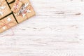 Christmas wooden background with gift boxes and decor. Top view with copy space for your text. Toned Royalty Free Stock Photo