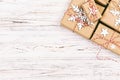 Christmas wooden background with gift boxes and decor. Top view with copy space for your text. Toned Royalty Free Stock Photo