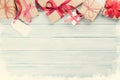 Christmas wooden background with gift boxes and snow Royalty Free Stock Photo