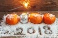 Christmas decorations on a wooden background Royalty Free Stock Photo