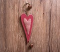 Christmas wooden decorations heart and christmas bell hanging on Royalty Free Stock Photo