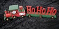 Christmas wooden HoHo santa claus train gift decorated with star Royalty Free Stock Photo