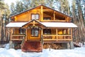 Christmas wooden mansion at pine forest