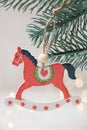 Christmas wooden toy in form red horse Royalty Free Stock Photo