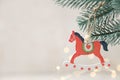 Christmas wooden toy in form red horse Royalty Free Stock Photo