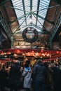 Christmas wreath above Olivers Bakery stall at Borough Market, London, UK