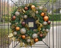 Christmas Wreath adorning an entrance gate outside a mansion in Dallas, Texas