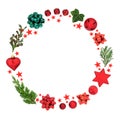 Christmas Wreath with Baubles Stars and Greenery Royalty Free Stock Photo