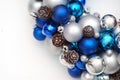 Christmas Wreath blue and Silver Balls or Cristmas Globes Decorated with Pinecones. Isolated with Copy Space.