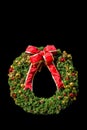 Christmas wreath with bright red bow Royalty Free Stock Photo