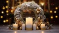 Christmas wreath with candles on a wooden table. Bokeh background Royalty Free Stock Photo