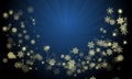 Christmas wreath created from glowing gold color snow flakes on gradient blue color background with ray lights at center. Royalty Free Stock Photo