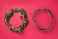 Christmas wreath and crown of thorns on red background. Remember the real Reason of the Season. Christian Christmas and Royalty Free Stock Photo