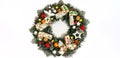 Christmas wreath decorating the front door for the holidays made of spruce, silver bows, stars and Christmas balls Royalty Free Stock Photo