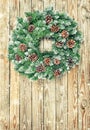 Christmas wreath decoration wooden background vintage toned Royalty Free Stock Photo
