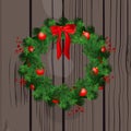 Christmas wreath decorations with fir tree, striped bows, pine cones, holly berries and garland decorative elements Royalty Free Stock Photo