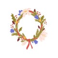 Christmas wreath with fir branches and flowers. Circle round Xmas ornament decorated with winter berries, cones and