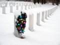 Christmas wreath on a grave Royalty Free Stock Photo