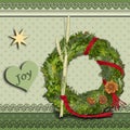 Christmas wreath on a green vintage scrapbooking style christmas card Royalty Free Stock Photo