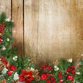 Christmas wreath on grunge wood texture with holly,firtree,vÃÂ­scum Royalty Free Stock Photo