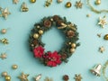 Christmas wreath on light blue background Royalty Free Stock Photo