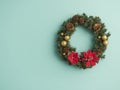 Christmas wreath on light blue background Royalty Free Stock Photo