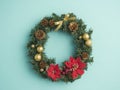 Christmas wreath on light blue background Royalty Free Stock Photo