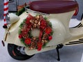 Christmas wreath on motorcycle