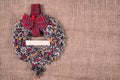 Christmas wreath on an old brown cloth Royalty Free Stock Photo