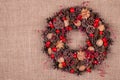 Christmas wreath on an old brown cloth Royalty Free Stock Photo