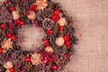 Christmas wreath on an old brown cloth Royalty Free Stock Photo