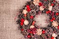 Christmas wreath on an old brown cloth Royalty Free Stock Photo