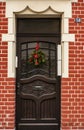 Christmas wreath on the old door Royalty Free Stock Photo