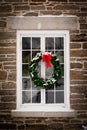Christmas Wreath on Old Window Pane Royalty Free Stock Photo