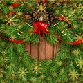 Christmas wreath with pine twigs, cones and red silk ribbon bow Royalty Free Stock Photo