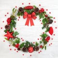 Christmas Wreath with Red Bow and Winter Flora