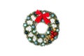 Christmas wreath with a red bow and Christmas toys balls. Royalty Free Stock Photo