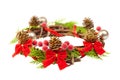 christmas wreath with red ribbon,pine cones and golden decoration isolated on white background Royalty Free Stock Photo